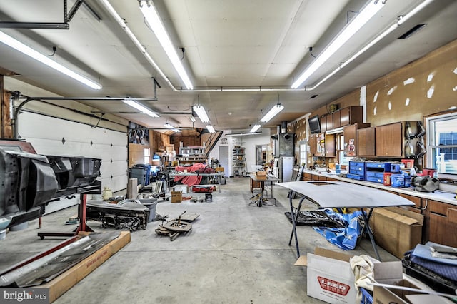 garage featuring a workshop area