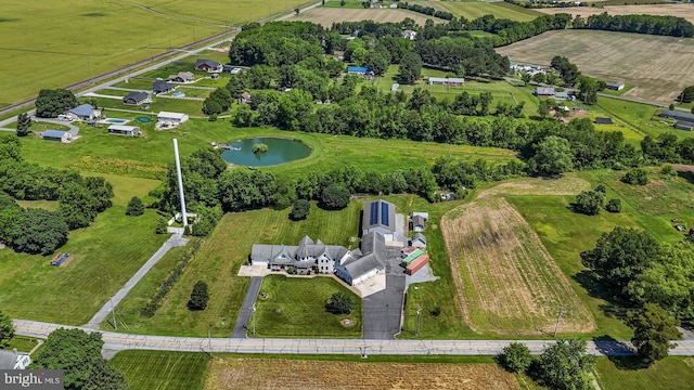 bird's eye view featuring a rural view and a water view