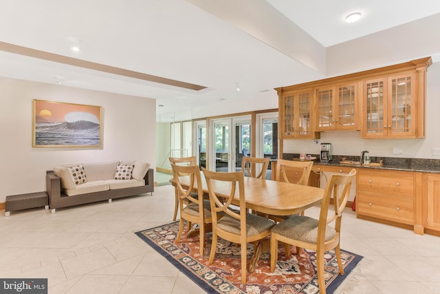 dining room with light tile patterned flooring