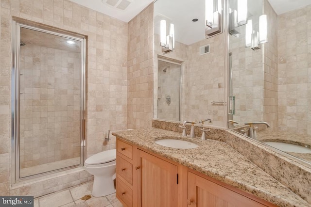 full bath featuring visible vents, a shower stall, toilet, and vanity