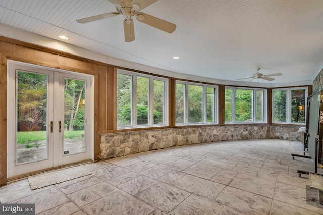 unfurnished sunroom featuring french doors