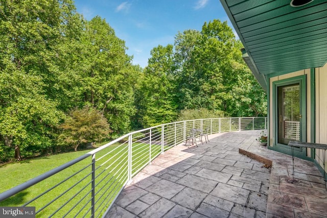 view of patio with a balcony