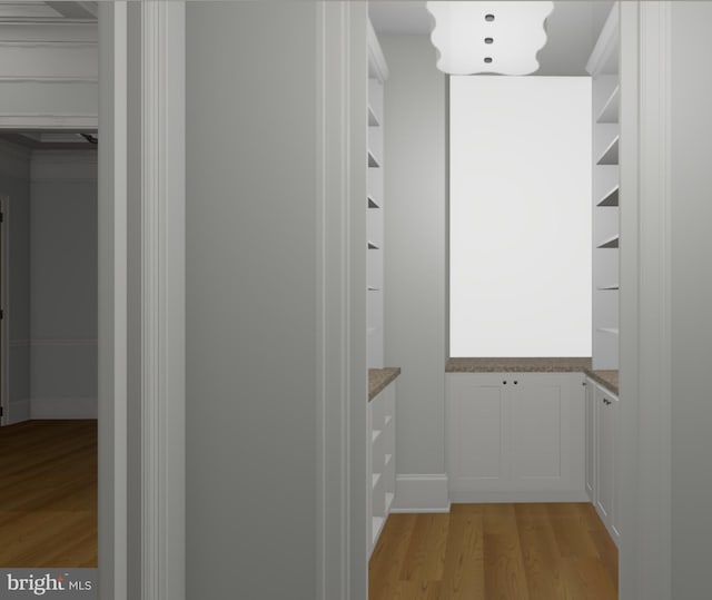 hallway featuring light hardwood / wood-style flooring