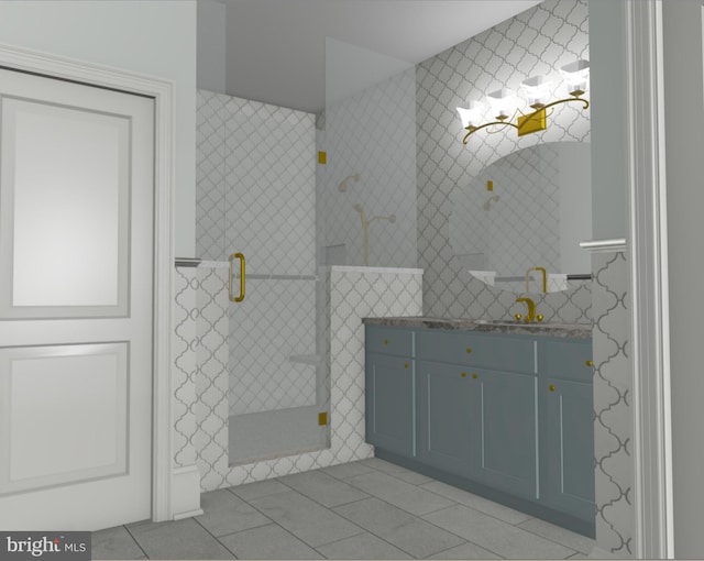 bathroom with tile patterned floors, vanity, and tiled shower