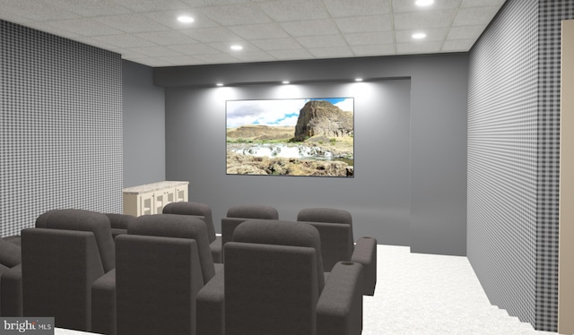 cinema room featuring a drop ceiling