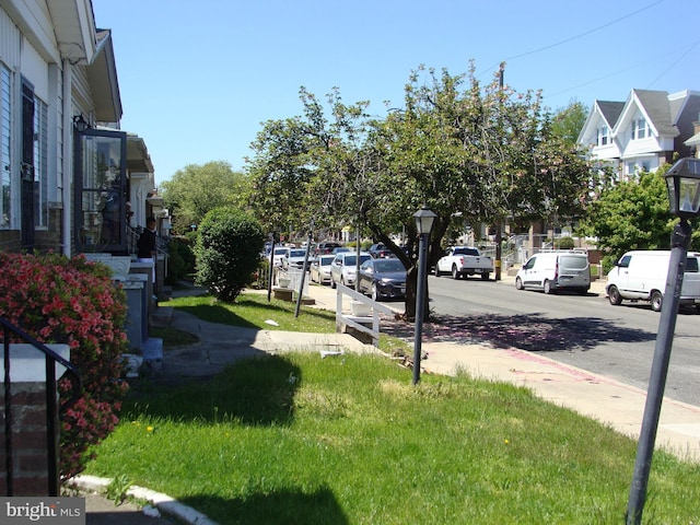 exterior space with street lights and sidewalks