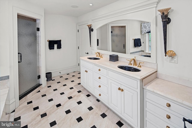 bathroom with vanity and walk in shower