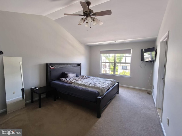 bedroom featuring ceiling fan, carpet floors, and lofted ceiling