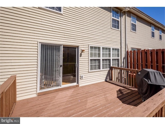 wooden terrace with grilling area