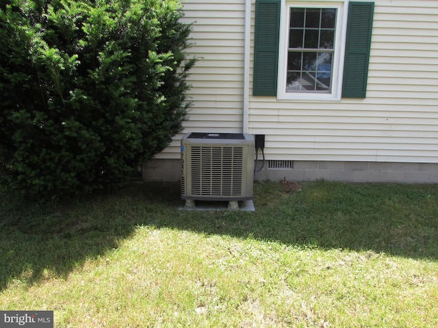 exterior details featuring central AC unit