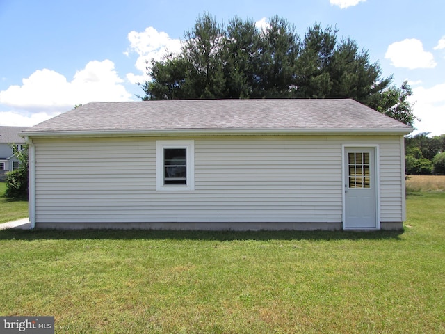 view of property exterior with a lawn