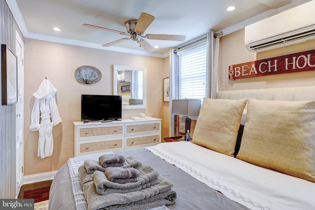 bedroom featuring a wall unit AC, ceiling fan, wood-type flooring, and ornamental molding