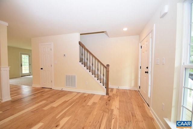 foyer entrance featuring light wood-type flooring