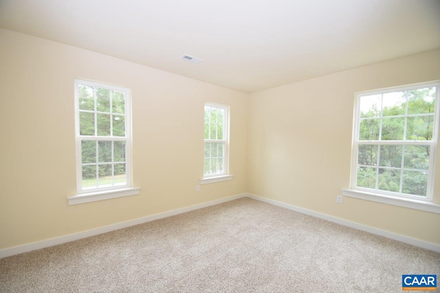 view of carpeted spare room