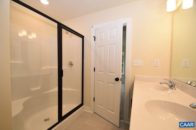 bathroom with sink and walk in shower