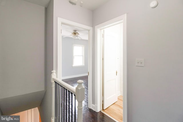 hallway featuring hardwood / wood-style flooring