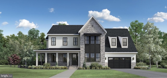 view of front of home featuring a front lawn, a porch, and a garage