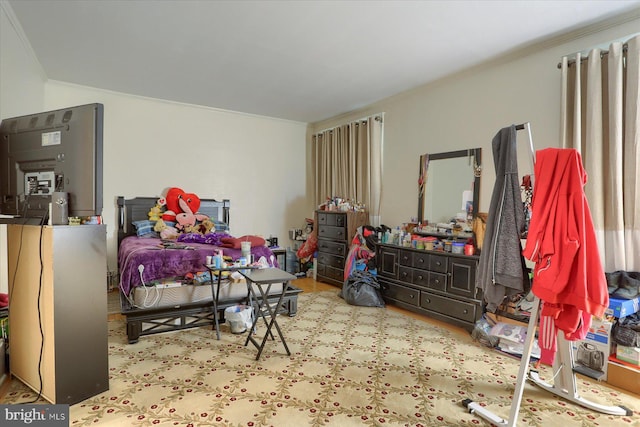 bedroom with crown molding