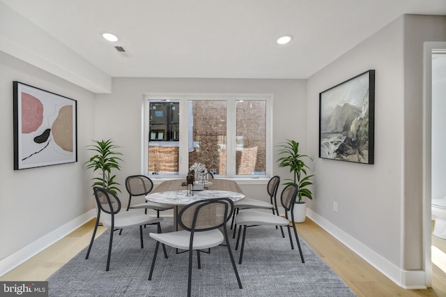 dining area featuring light hardwood / wood-style flooring