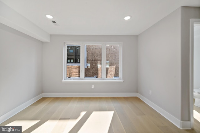 empty room featuring light hardwood / wood-style floors