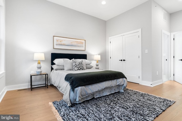 bedroom featuring a closet and hardwood / wood-style flooring