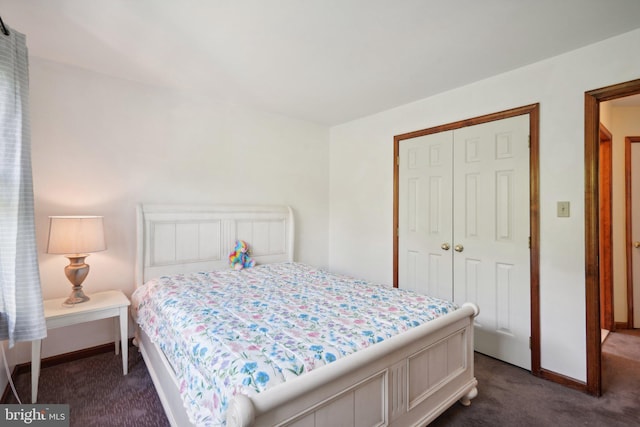 carpeted bedroom featuring a closet