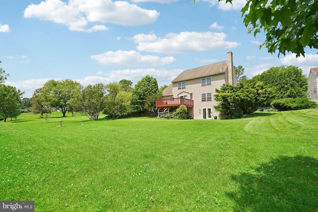 view of yard featuring a deck