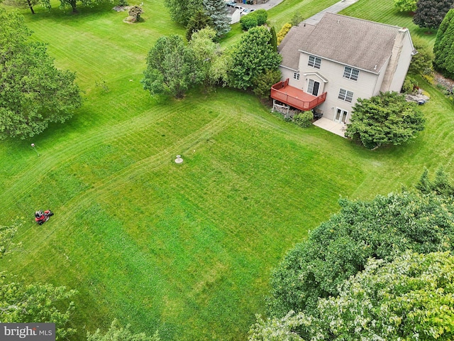 birds eye view of property with a rural view