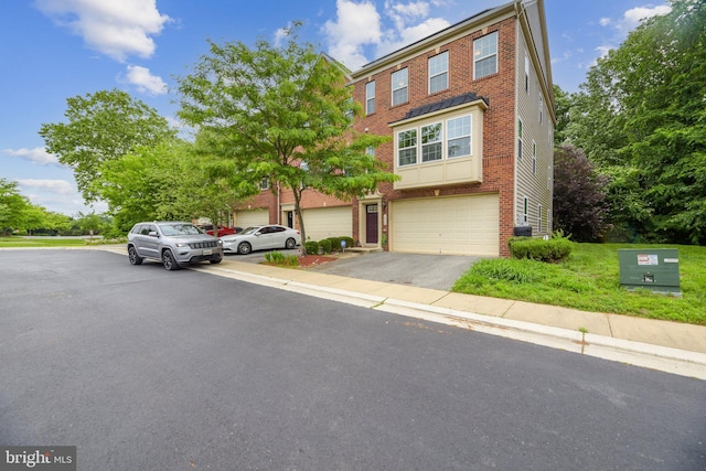 view of property featuring a garage