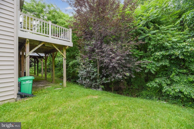 view of yard featuring a wooden deck