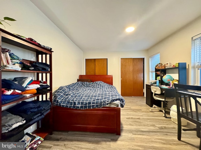 bedroom with light wood-type flooring