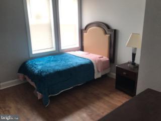603 Allendale St, Baltimore, MD 21229 - bedroom with wood finished floors and baseboards