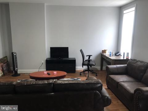 603 Allendale St, Baltimore, MD 21229 - living room with wood finished floors and baseboards
