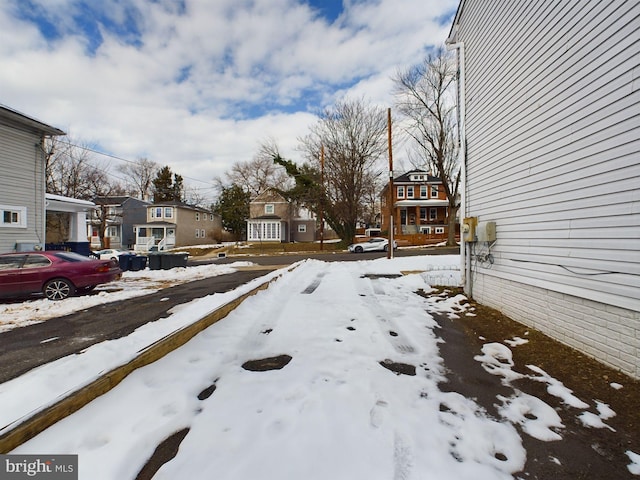 view of yard layered in snow