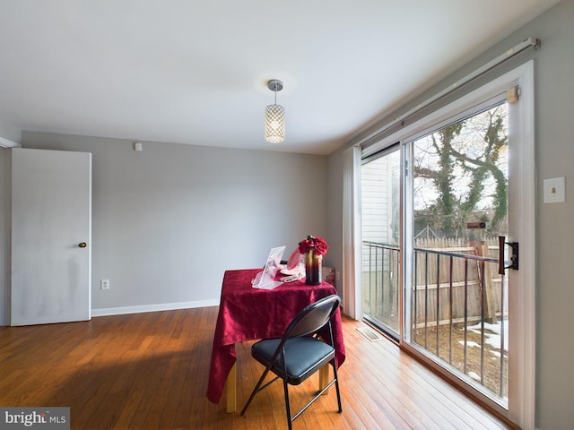 dining space featuring hardwood / wood-style floors