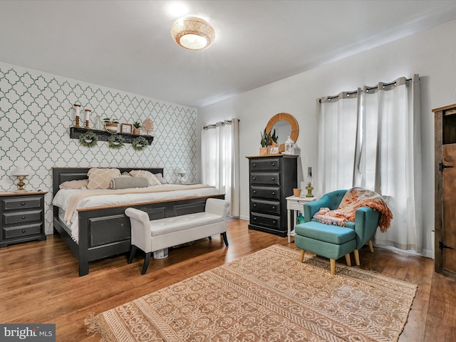 bedroom featuring wood-type flooring