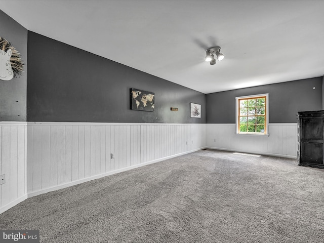 unfurnished living room with carpet flooring