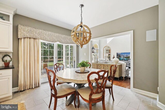 dining area with a chandelier