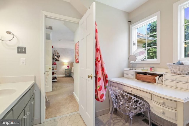 bathroom featuring tile patterned floors and vanity