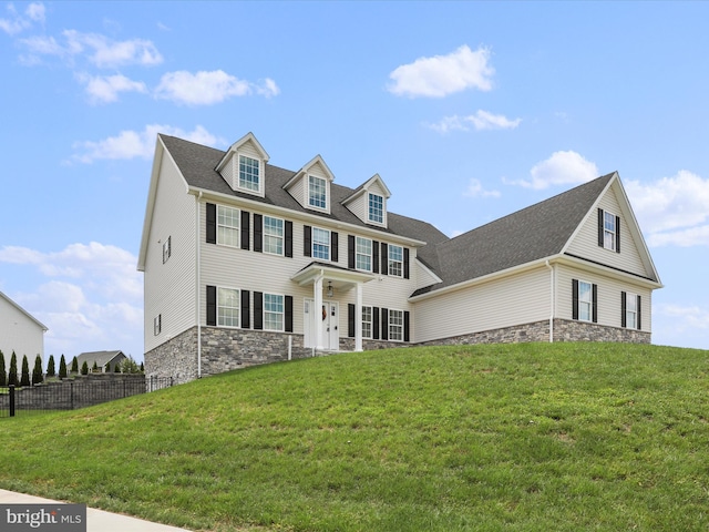 view of front of house with a front lawn