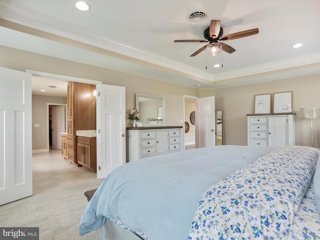 bedroom with light carpet, ensuite bath, ceiling fan, and crown molding