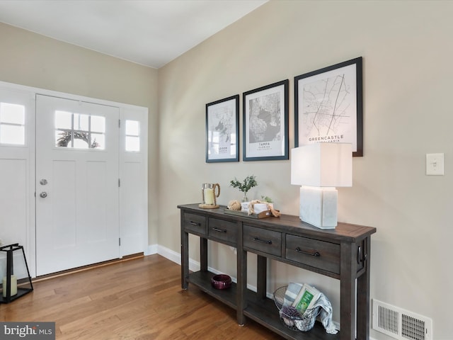 foyer entrance featuring light hardwood / wood-style floors