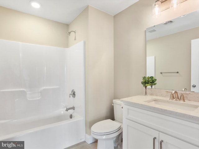 full bathroom featuring vanity, toilet, and bathtub / shower combination