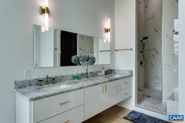 225 Cherry Ridge Ln, Lexington, VA 24450 - bathroom featuring hardwood / wood-style floors, vanity, and a tile shower