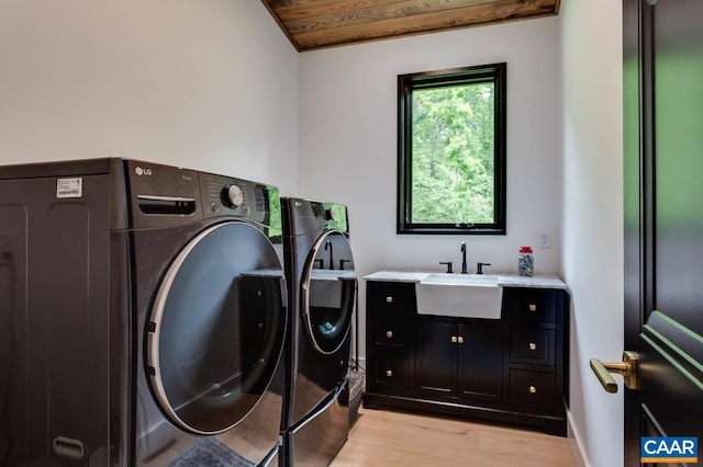 225 Cherry Ridge Ln, Lexington, VA 24450 - washroom with sink, light hardwood / wood-style floors, wooden ceiling, and washing machine and clothes dryer