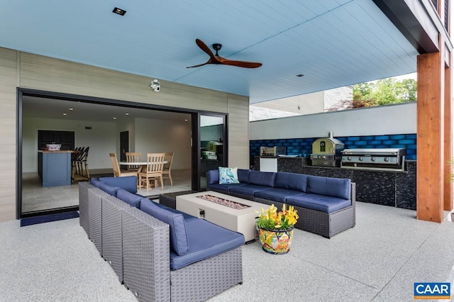 225 Cherry Ridge Ln, Lexington, VA 24450 - view of patio with a grill, an outdoor living space with a fire pit, and an outdoor kitchen
