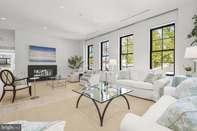 living room featuring light carpet