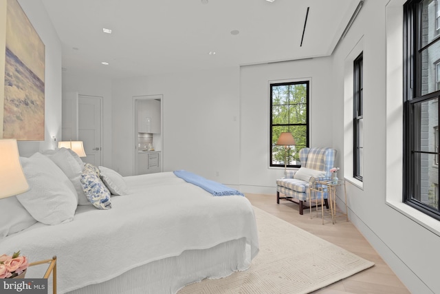 bedroom featuring light wood-type flooring