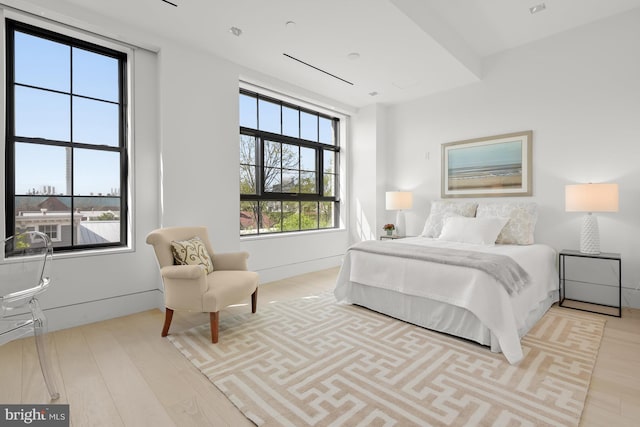 bedroom featuring light wood-type flooring