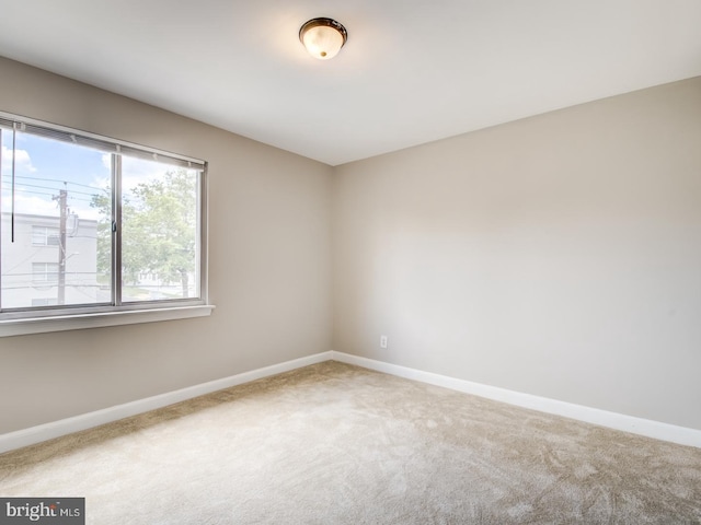 view of carpeted spare room